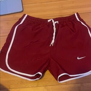 Nike woman’s  Burgundy Athletic Shorts with White Trim